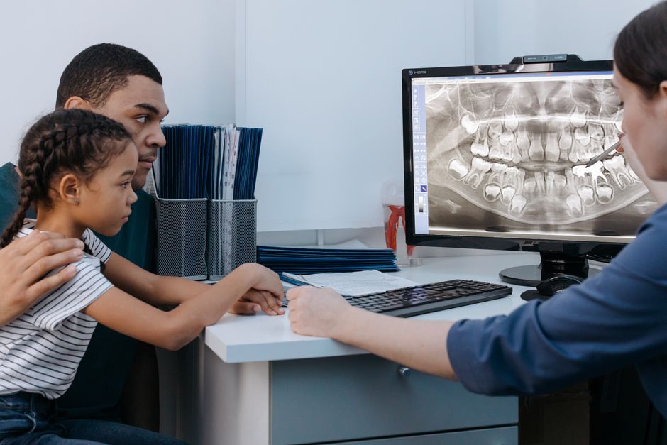 Endodontic consult checklist: patient comparing written treatment estimates