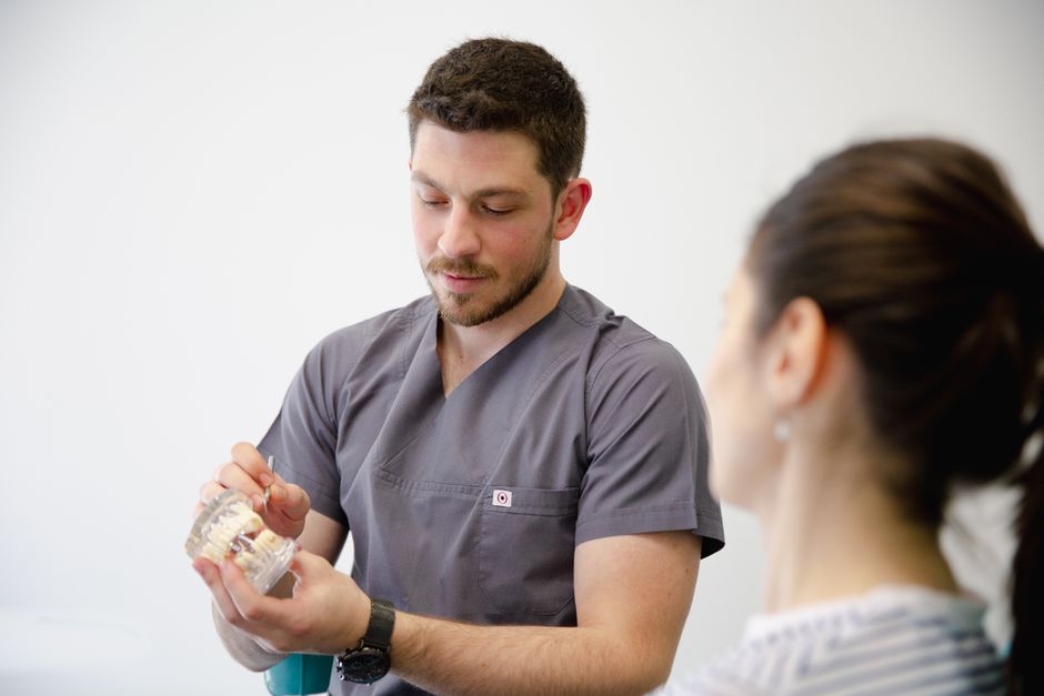 Dental implant consult Arizona: reviewing a written treatment estimate