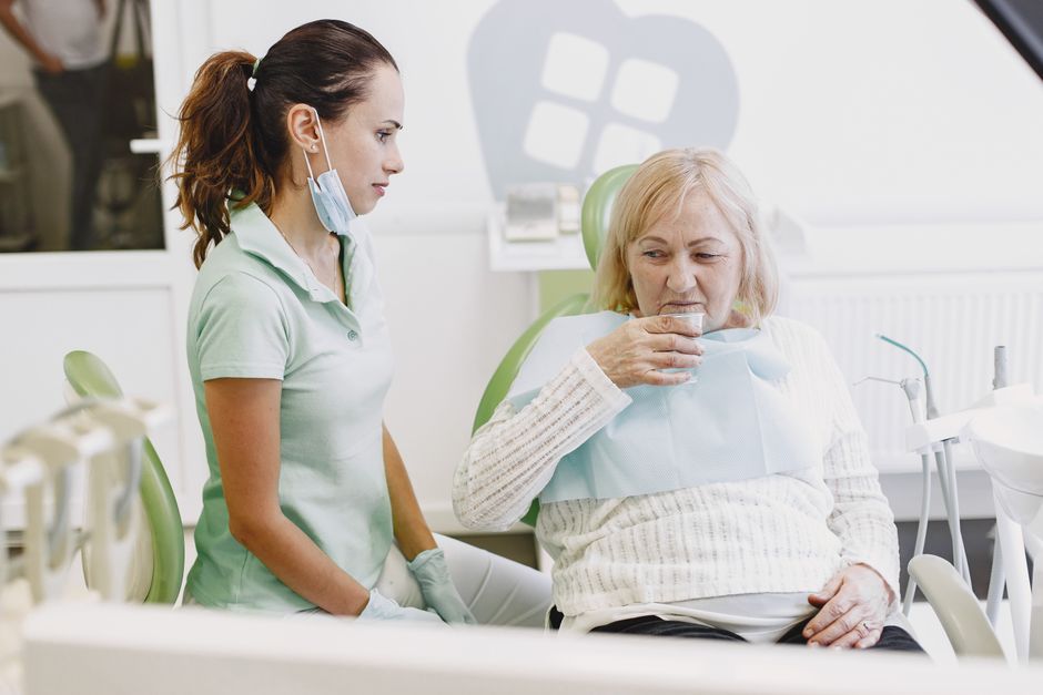 Senior dentistry Arizona: reviewing written estimates with a caregiver